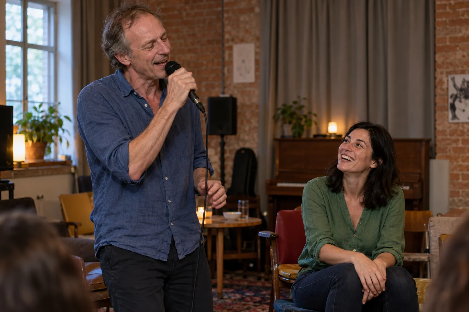 Fictional karaoke evening: a man sings while a friend listens and laughs between lines.