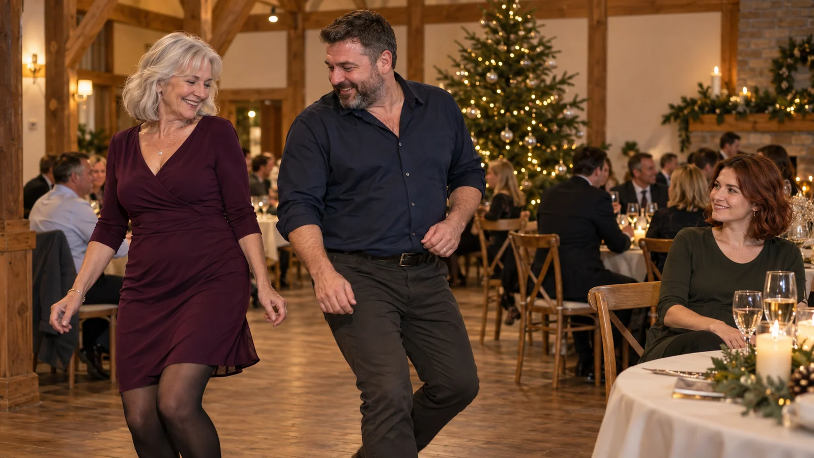 Fictional guests dance at a New Year party in a timber hall.